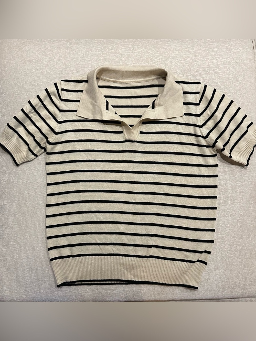 Woman’s Cream and Black Striped Polo Top